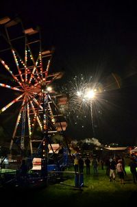 Firework display at night