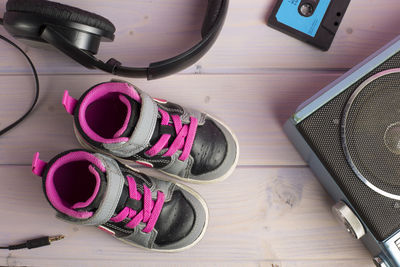 Directly above view of shoes and technologies table