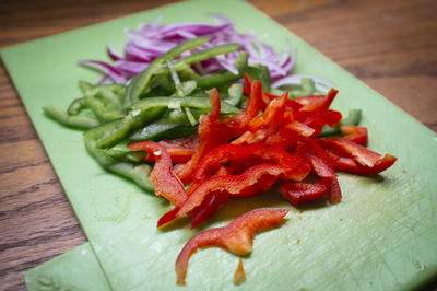 High angle view of chopped vegetables on table