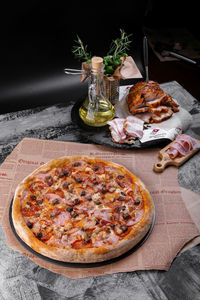 Food served on table against black background