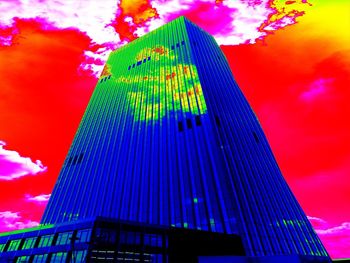 Low angle view of illuminated building against sky