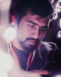 Close-up of man with camera