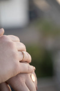 Engagement ring on finger