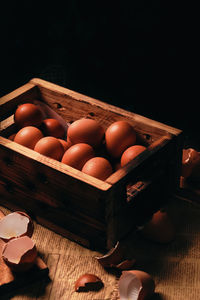 High angle view of oranges in crate
