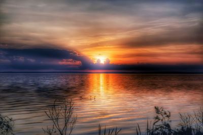 Scenic view of sunset over sea