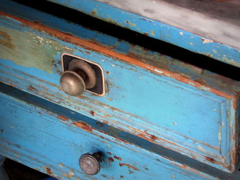 High angle view of weathered drawers