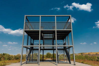 Low angle view of metallic structure on sunny day