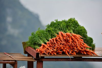 Close-up of food on table against sky