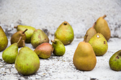 Close-up of pears on floor