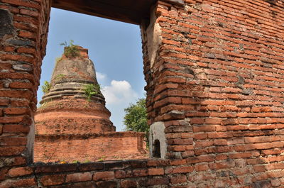 Low angle view of old building against sky