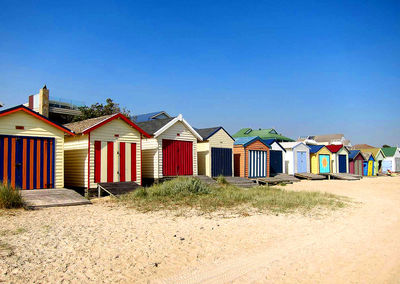 Beach huts and blue skies