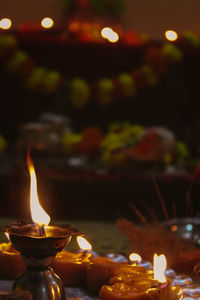 Close-up of lit tea light candles