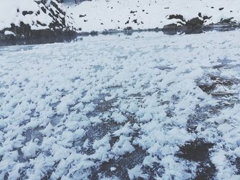 Scenic view of frozen lake against sky