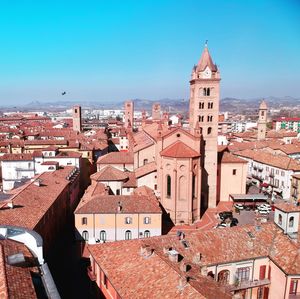 High angle view of townscape against blue sky