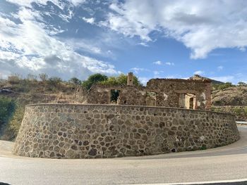 View of fort against cloudy sky