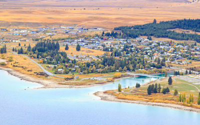 Aerial view of river amidst landscape against sky