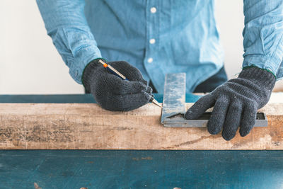 Man working on wood