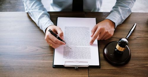 High angle view of man using laptop on table