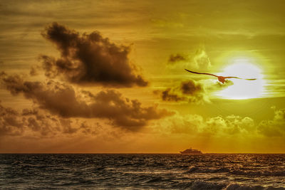 Scenic view of sea against sky during sunset