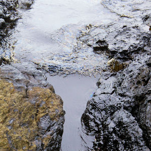 High angle view of rock formation on beach