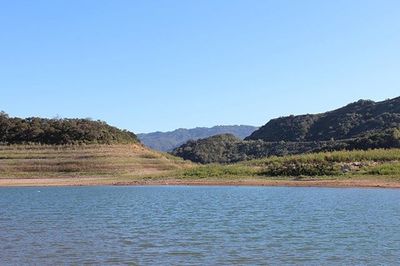 Scenic view of mountains against clear blue sky