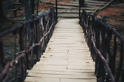 Wooden footbridge in forest