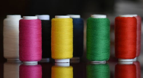 Close-up of colorful spools