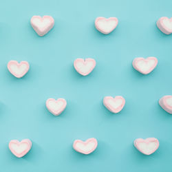 Close-up of heart shape over white background