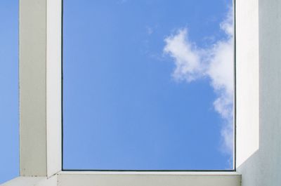 Low angle view of built structure against blue sky