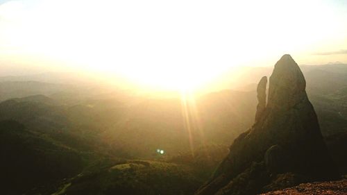 Scenic view of landscape against sky during sunset