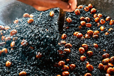 Close-up of person preparing food