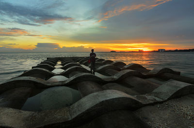 Scenic view of sea against sky during sunset