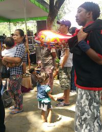 Group of people standing outdoors