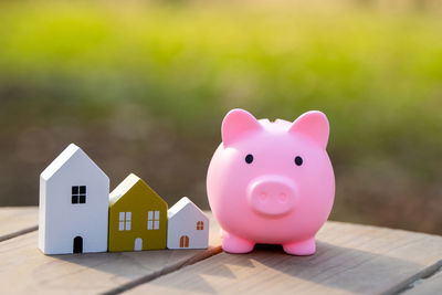 Close-up of piggy bank on table