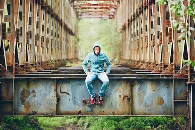 Portrait of man sitting outdoors