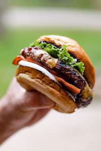 Close-up of hand holding ice cream