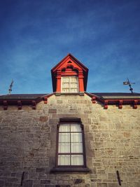 Low angle view of old building against sky