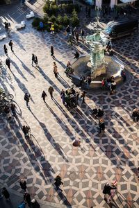 High angle view of people walking on street