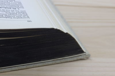 High angle view of open book on table