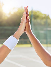 Cropped hand of woman holding hands