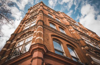 Low angle view of old building against sky