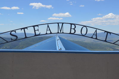 View of bridge against cloudy sky