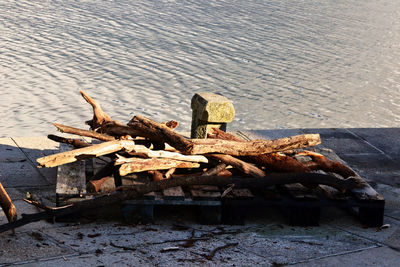 Stack of rusty metal in water