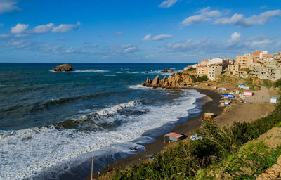 Scenic view of beach against sky