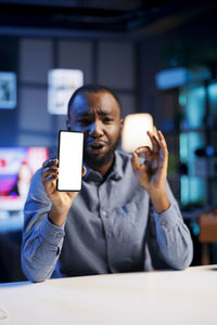 Young woman using mobile phone