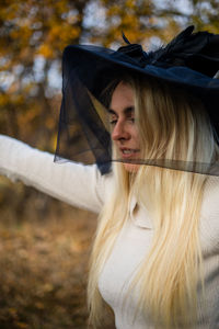 Close-up of woman looking away