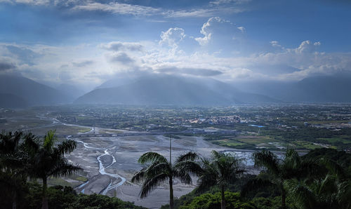 High angle view of plants and mountains against sky