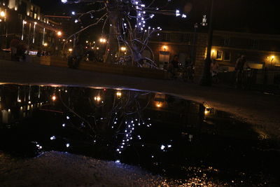 Illuminated street light at night