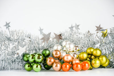 Close-up of fruits in snow