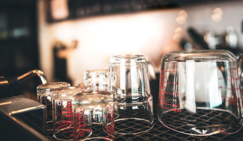 Close-up of wine glasses on table